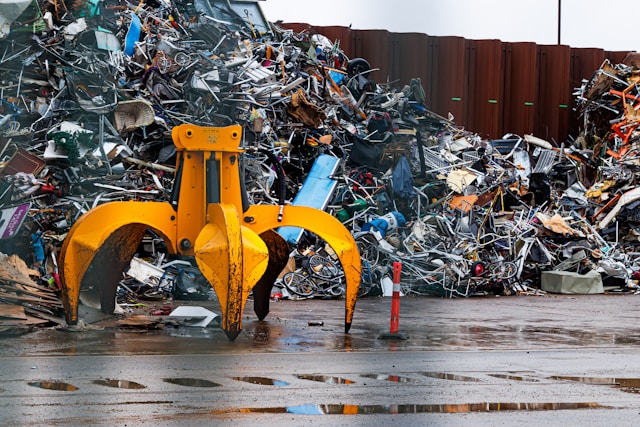Robotic arms sorting recyclables in a modern waste management center