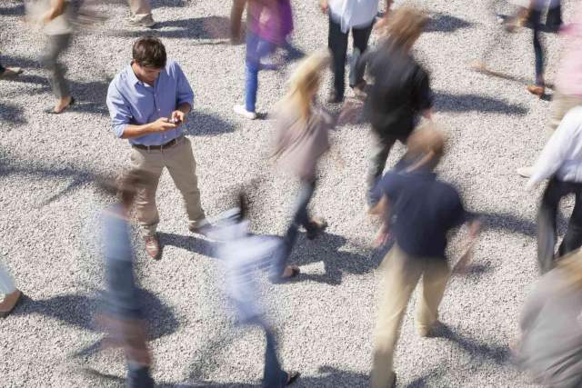 crowd ignoring someone in need symbolizing the bystander effect