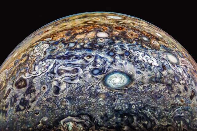 Jupiter and its storms captured by Juno spacecraft